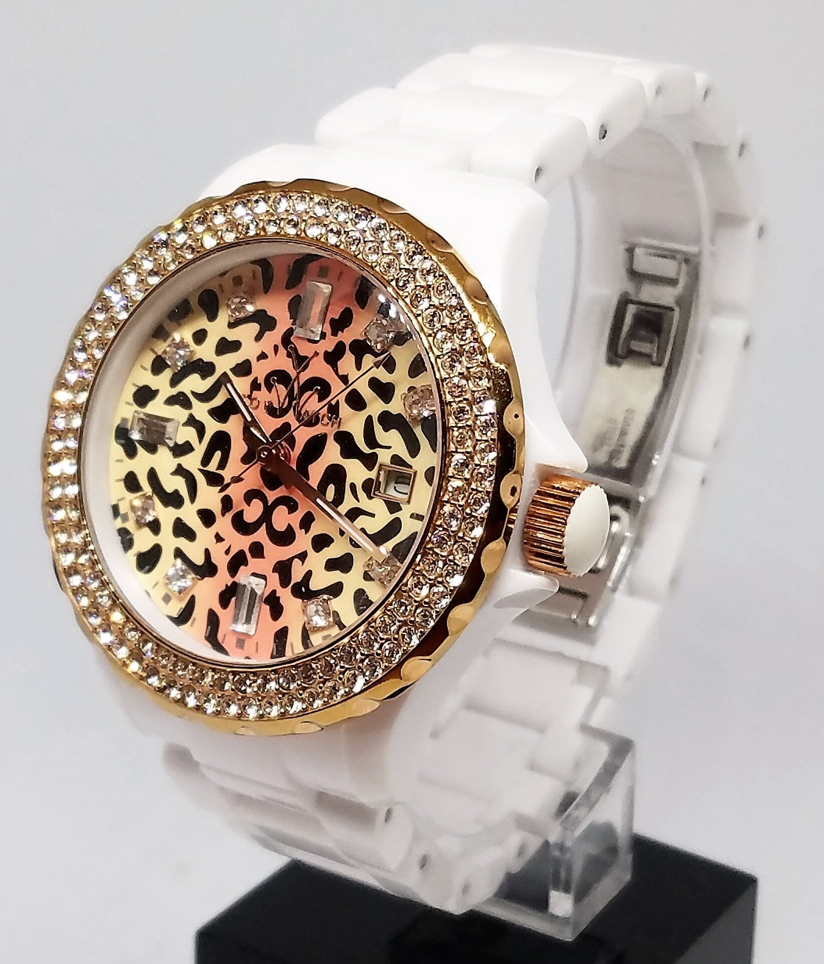 White plasteramic toy watch with safari leopard dial and Swarovski crystal markers, by Designer Gifts.