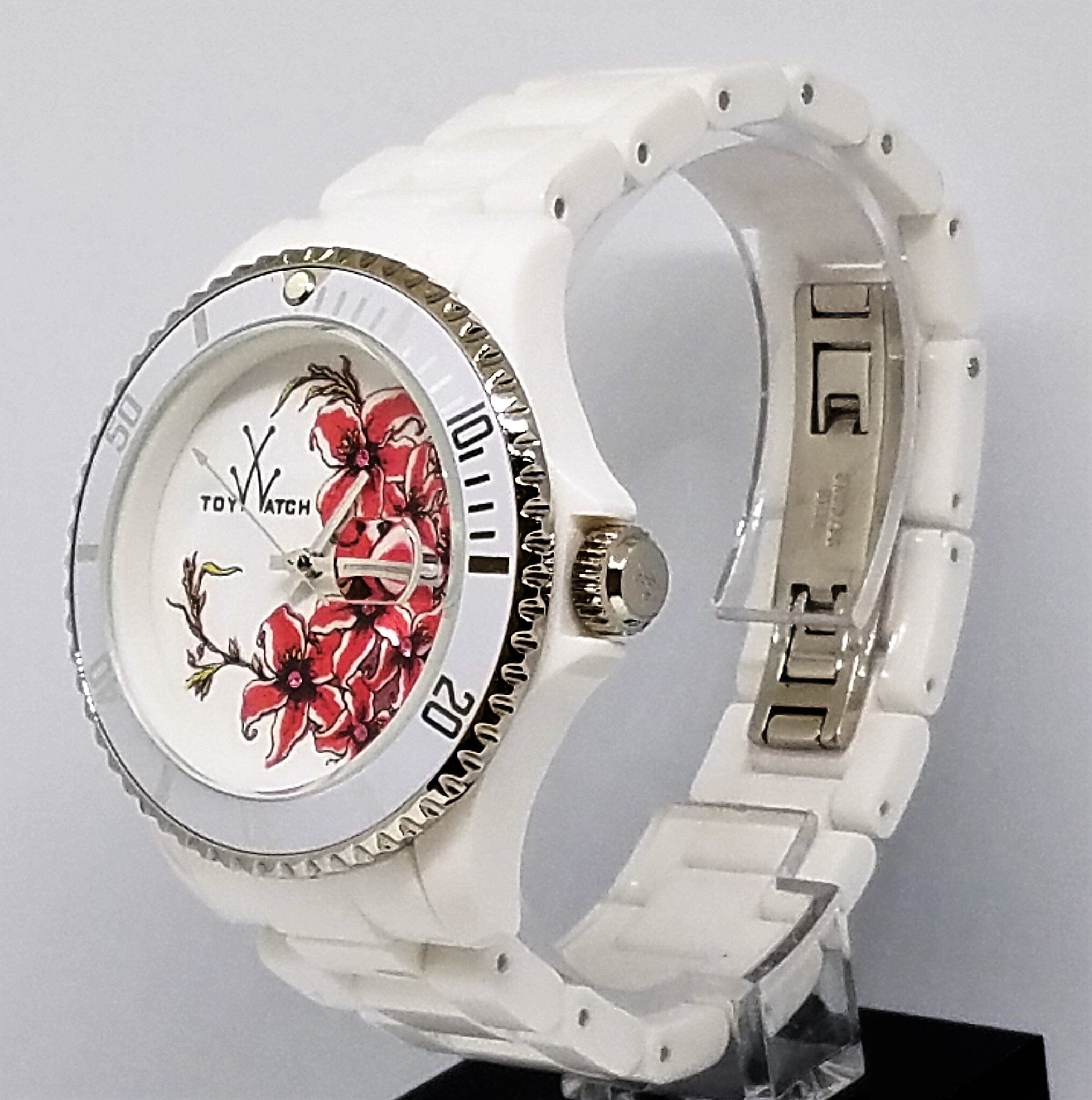 White Lilium Passion tattoo-themed toy watch by Designer Gifts, featuring floral design on a white watch face and strap.