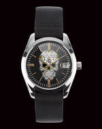 ToyWatch TOYPULP white dial watch with black strap, close-up showing sleek design and minimalist face.