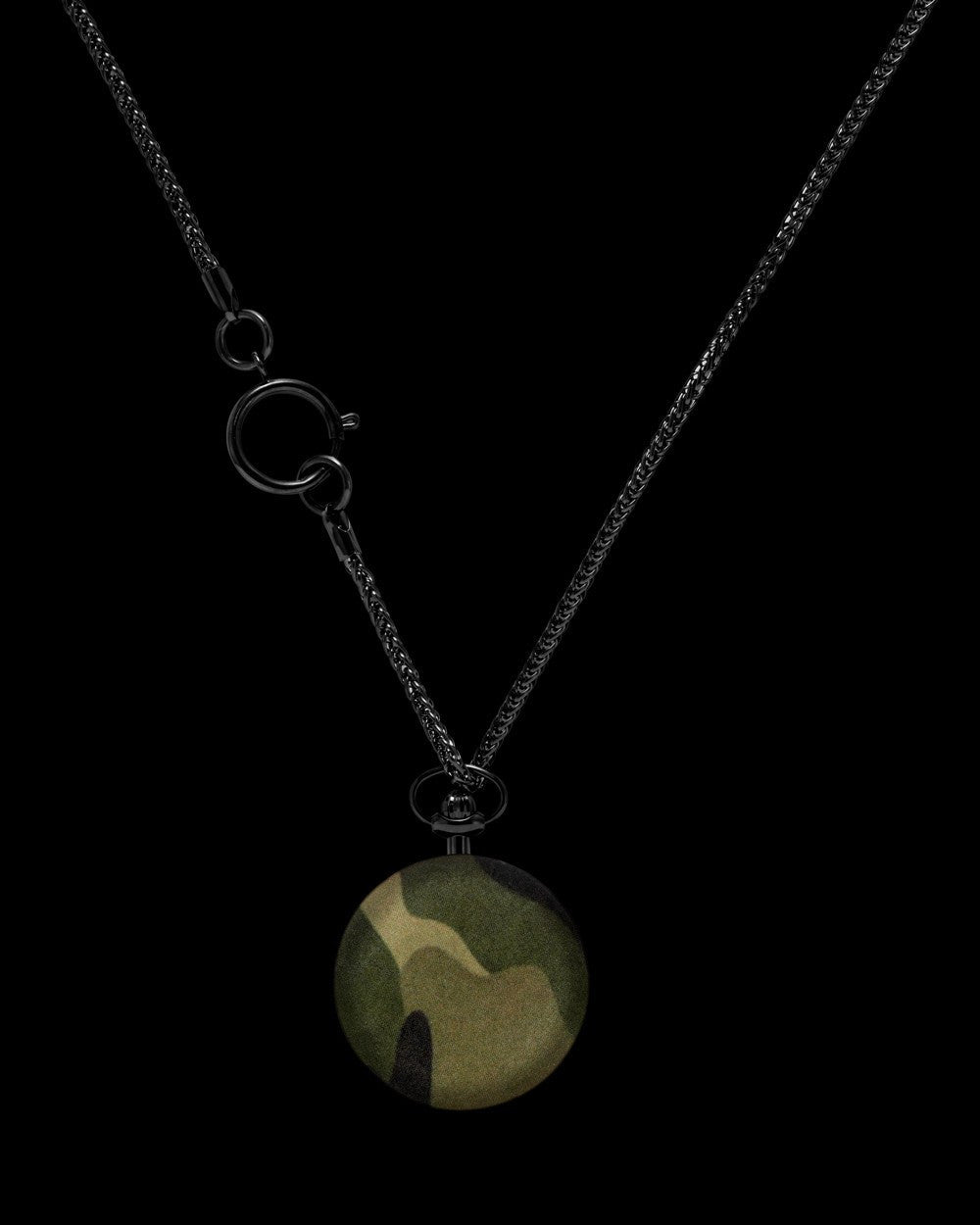 ToyWatch TOYSWING Camouflage watch with a camouflage strap and round dial, shown from the back.
